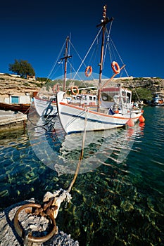 Fishing boars in harbour in fishing village of Mandrakia, Milos island, Greece