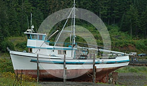 Fishing boat aground photo