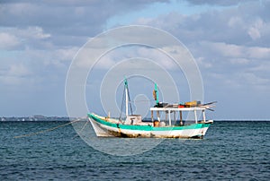 Fishing boat anchored in Cancun's Puerto Juarez Harbor on Mexico's Caribbean coast