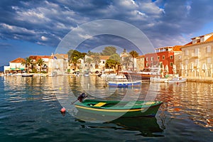Fishing boat anchoring in beautiful Sutivan port, Brac island, Croatia. Sutivan on Island Brac in Croatia. Made of well known