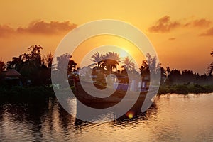 A fishing boat on the background of dawn. Hoian. Vietnam photo