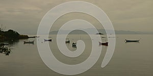 Fishing boat in the bay on a grey day