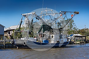 Fishing boat on Bayou Barataria Lafitte New Orleans
