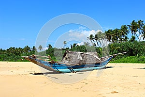 Fishing boat on the beach of Bentota