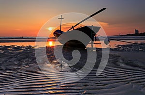 Fishing boat at the beach during sunset, Thailand