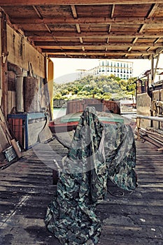 Fishing boat being repaired in a hangar of the pharo district in Marseille