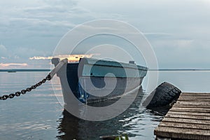 Fishing boat on a chain