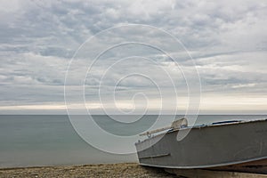 Fishing boat and cloudy sky