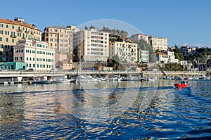 Fishing boat coming out of the port of Savona