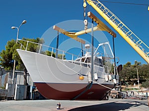 Fishing boat on crane