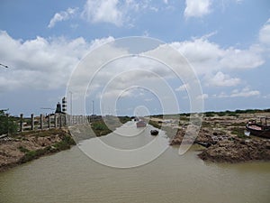 Fishing boat in creek and then move to sea.