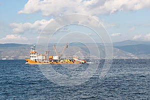 Fishing boat cruising at sea