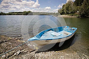 Fishing boat on the Danube River shore in Romania