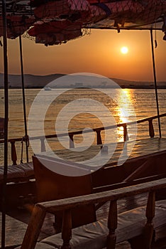 Fishing boat deck with sunset view of the harbour