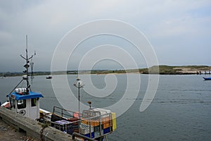Fishing Boat docked on the Coquet estuary photo