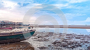 Fishing boat docking on the sand bars