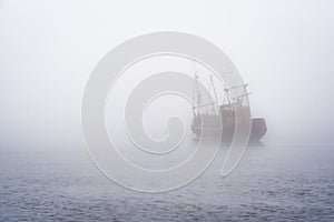 Fishing Boat in Fog
