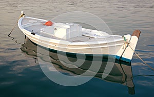 A fishing boat in the harbor at Nafplio in Greece