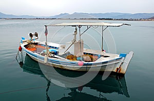 A fishing boat in the harbor at Nafplio in Greece