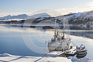 Fishing boat in harbor of Norther Norway