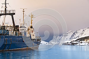 Fishing boat in harbor of Norther Norway