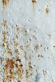 Fishing boat hull with dents, scrapes and rust