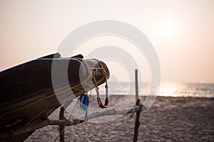 Fishing boat of Indian fishermen on the sandy beach in Kerala, fishing village Mararikulam.