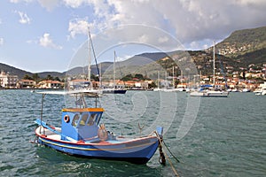 Fishing boat at Ithaki island in Greece photo