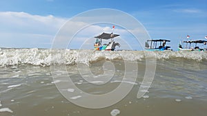 fishing boat on the \'Karang Jahe\' reef beach