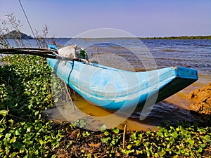 Fishing boat on lake shore