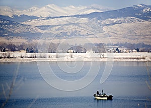 Fishing boat on a lake in winter