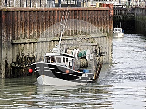 Fishing boat at Le Treport in France photo