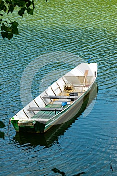 Fishing boat left alone in the lake