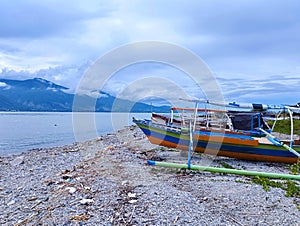 Fishing boat moored on the beach