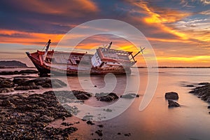 Fishing boat moored on the beach