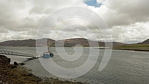 Fishing boat moored on remote Scottish Island