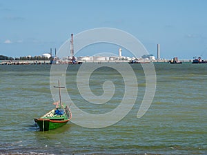 Fishing boat and oil storage in Rayong, Thailand