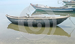 Fishing boat, Old wooden rowboat floating