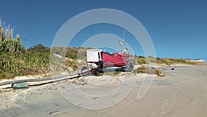 Fishing Boat Parked at Sand photo