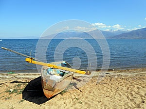 Fishing boat in a plaz