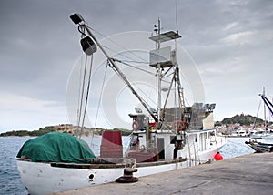 Fishing boat in port, harbor