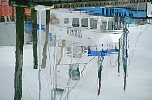 Fishing boat reflections in Westhaven marina