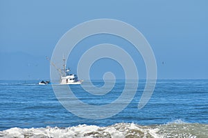 Fishing boat returning to the harbor.