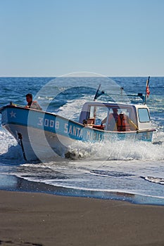 Fishing Boat Returns with the Catch
