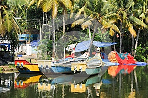 Fishing boat on the river near Kollam photo