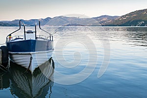 Fishing boat on river shore