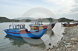 Fishing Boat on river, Vietnam.
