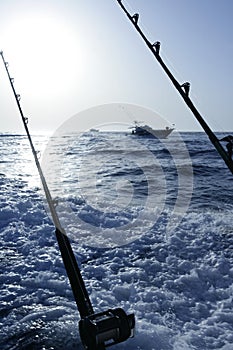 Fishing boat with rod and reels