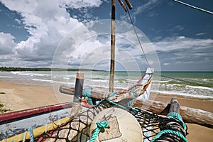 Fishing boat on sand beach