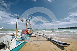 Fishing boat on sand beach